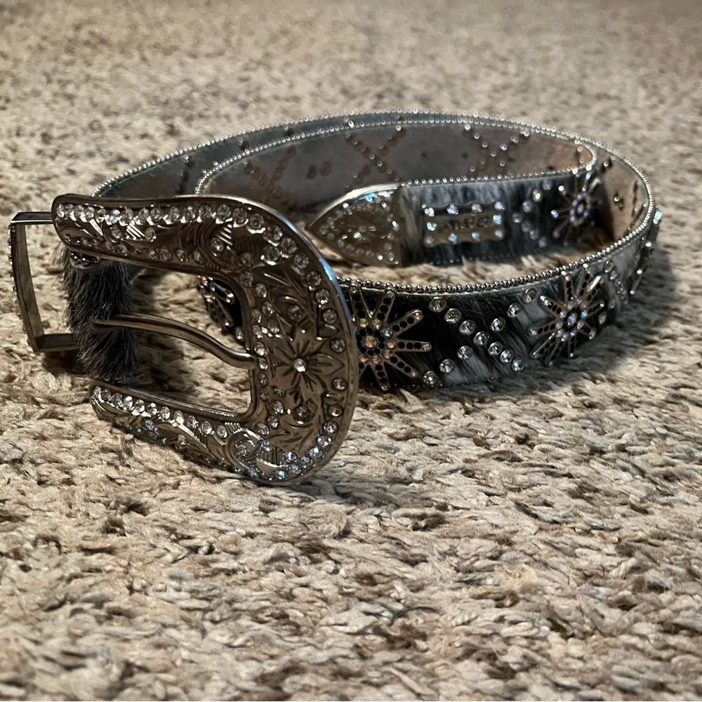 Women’s bling out belt was spur Conchos.